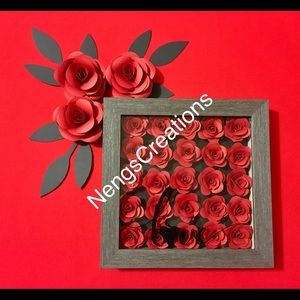 Paper flowers in a shadow box